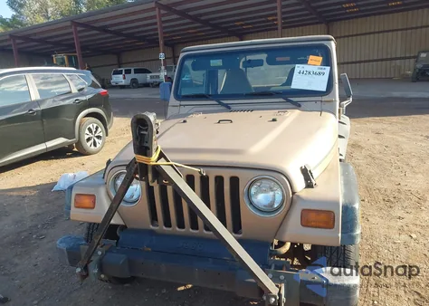 1999 Jeep Wrangler Sport из США, поврежденный, VIN 1J4FY19S9XP454305